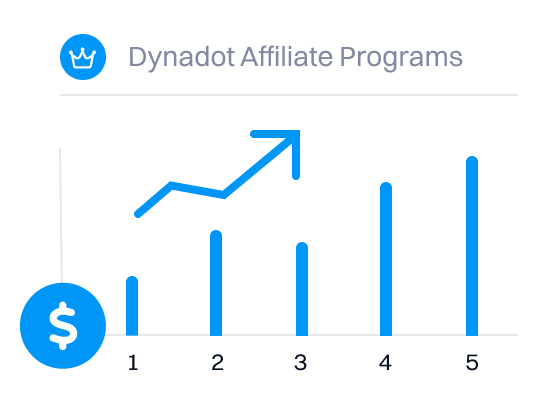 two girls sitting at a counter looking at a laptop smiling